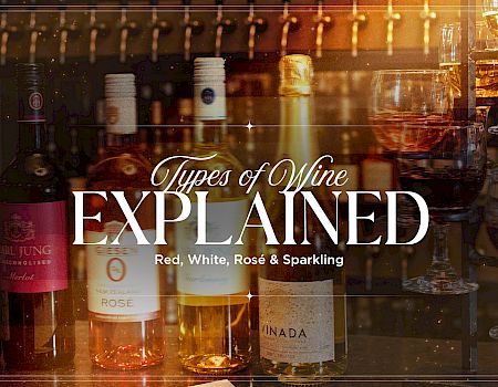 A wine-themed graphic shows bottles and glasses with text “Types of Wine Explained: Red, White, Rosé & Sparkling.”